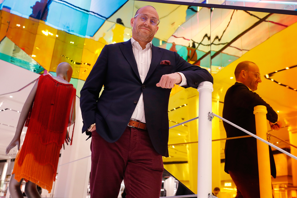 FILE - Saks Fifth Avenue President Marc Metrick poses for a portrait inside the company's flagship Fifth Avenue store, in New York, on Wednesday, Feb. 20, 2019. (AP Photo/Kathy Willens, File)