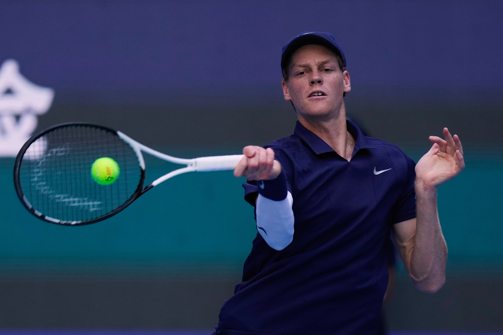 Jannik Sinner of Italy returns a forehand shot to Fabian Marozsan, of Hungary during a men's singles match of the China Open tennis tournament, at the National Tennis Center, in Beijing, China, Monday, Sept. 29, 2025. (AP Photo/Mahesh Kumar A.)