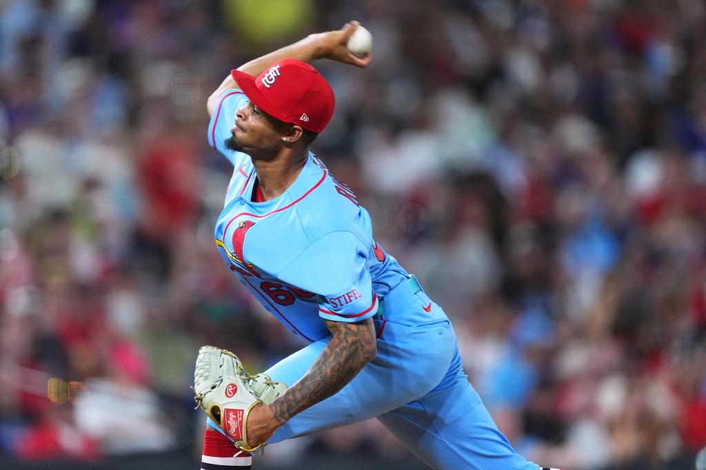 St. Louis Cardinals relief pitcher Hancel Rincon works against the Colorado Rockies in the sixth inning of a baseball game Saturday, Sept. 5, 2026, in Denver. (AP Photo/David Zalubowski)