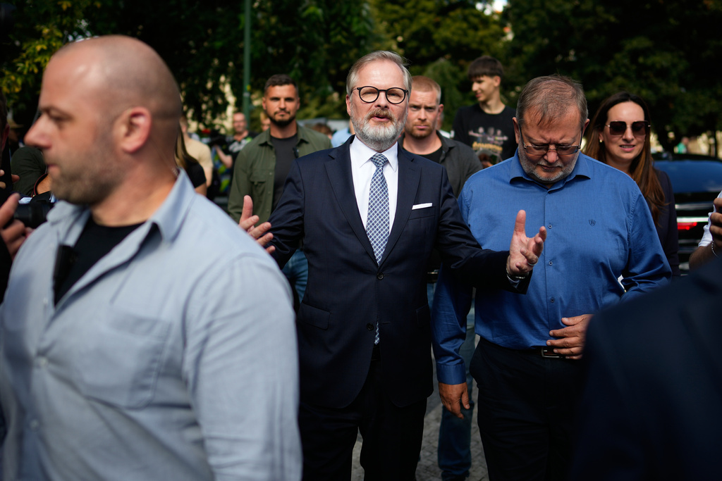 Czech Republic's Prime Minister and leader of coalition of three conservative parties called "Together" Petr Fiala talks to his supporters during a rally ahead of Parliamentary elections in Prague, Czech Republic, Sept. 3, 2025. (AP Photo/Petr David Josek)