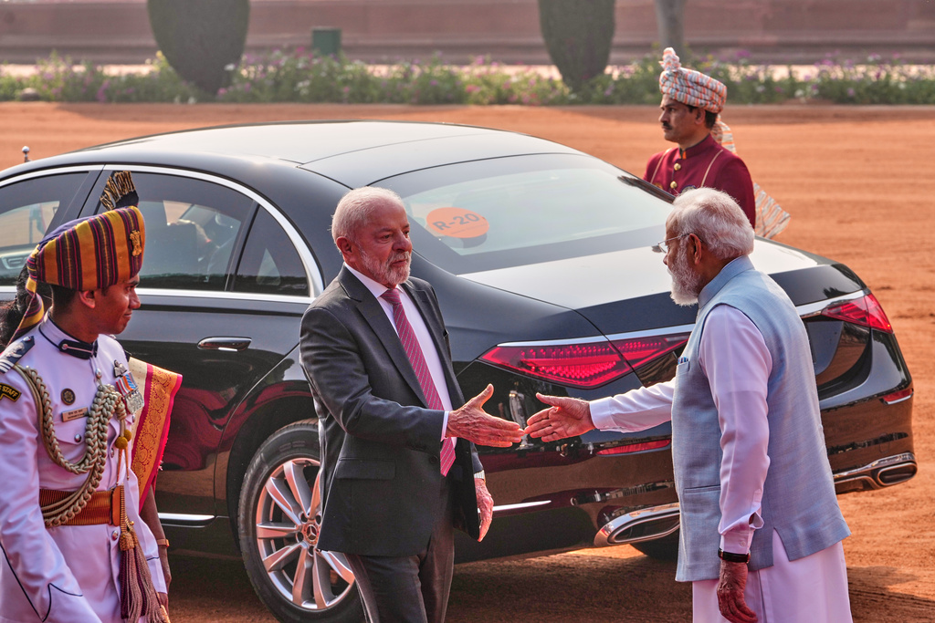 Brazilian President Luiz Inacio Lula da Silva shakes hands with India Prime Minister Narendra Modi, right, upon his arrival at the Indian Presidential Palace for his ceremonial reception in New Delhi, India, Saturday, Feb. 21, 2026. (AP Photo/Manish Swarup)
