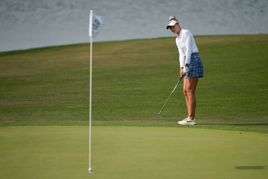 Nelly Korda chips to the green on the 17th hole during the third round of the Chevron Championship LPGA golf tournament Saturday, April 25, 2026, in Houston. (AP Photo/Ashley Landis)