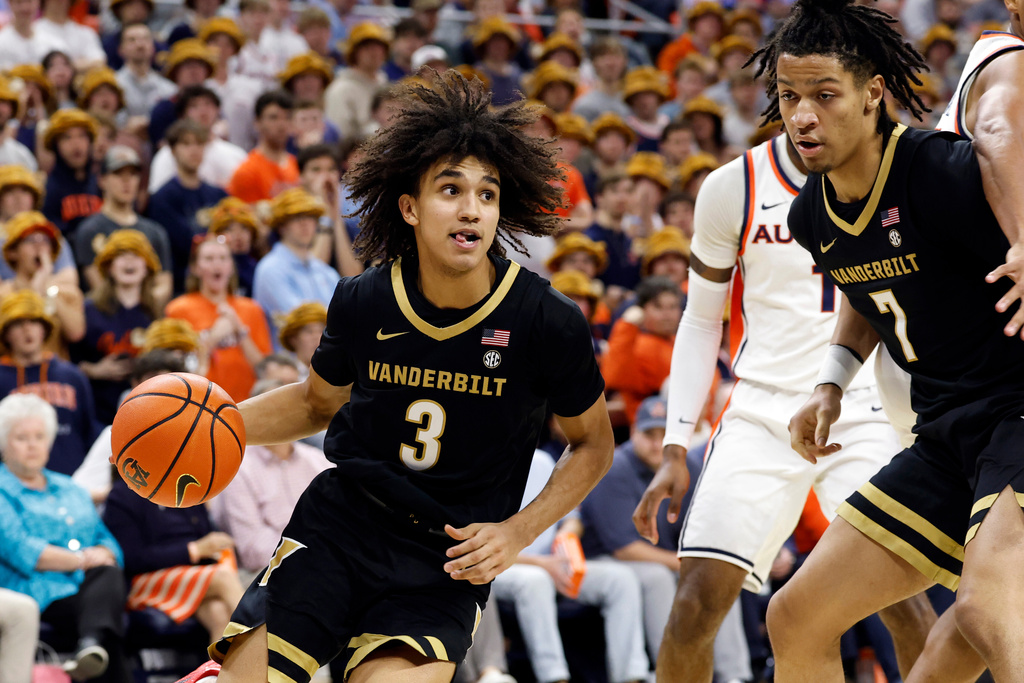 Vanderbilt guard Tyler Tanner (3) drives to the basket against Auburn during the first half of an NCAA college basketball game, Tuesday, Feb. 10, 2026, in Auburn, Ala. (AP Photo/Butch Dill)