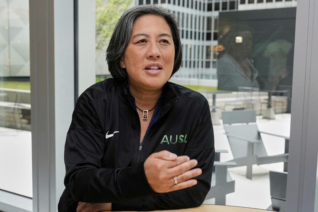 FILE - Athletes Unlimited Softball League Commissioner Kim Ng, a former Major League Baseball executive, is interviewed at Major League Baseball's headquarters in New York, Thursday, May 29, 2025. (AP Photo/Richard Drew, File)