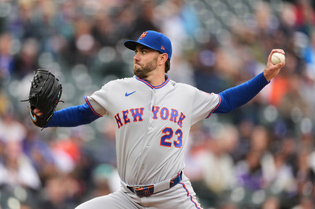 New York Mets relief pitcher David Peterson works against the Colorado Rockies in the fourth inning of a baseball game Monday, May 4, 2026, in Denver. (AP Photo/David Zalubowski)