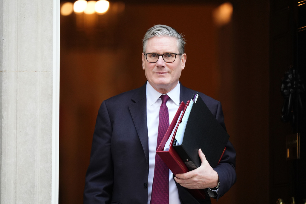 Britain's Prime Minister Sir Keir Starmer departs 10 Downing Street to attend Prime Minister's Questions at the Houses of Parliament, in London, Wednesday March 18, 2026. (Ben Whitley/PA via AP)