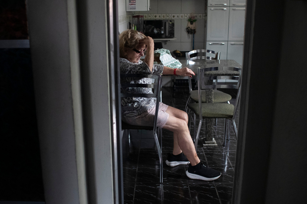 Maria Eva Marinho, who lost her son Nelson Marinho in the Air France flight 447 plane crash near the coast of Brazil on June 1, 2009, sits in her home before giving an interview in Rio de Janeiro, Thursday, May 21, 2026. (AP Photo/Bruna Prado)