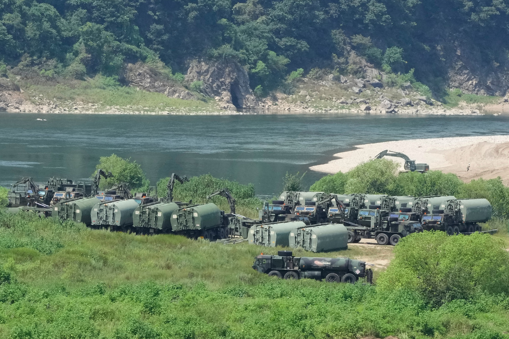 The U.S. Army's armored vehicles gather to cross a river at a training field in Yeoncheon, South Korea, near the border with North Korea, Tuesday, Aug. 18, 2026. (AP Photo/Ahn Young-joon)