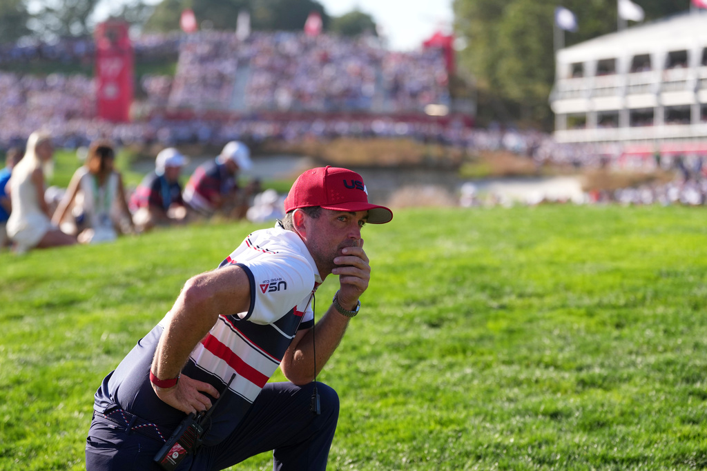 United States captain Keegan Bradley watches on the 16th hole during their singles match on the Bethpage Black golf course at the Ryder Cup golf tournament, Sunday, Sept. 28, 2025, in Farmingdale, N.Y. (AP Photo/Matt Slocum)