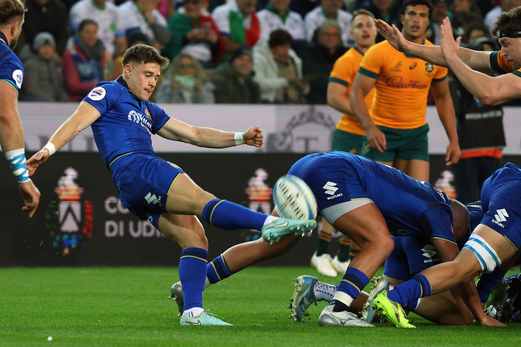 Italy's Stephen Varney kicks the ball during the rugby union match between Italy and Australia in Udine, Italy, Saturday, Nov. 8, 2025. (Andrea Bressanutti/LaPresse via AP)