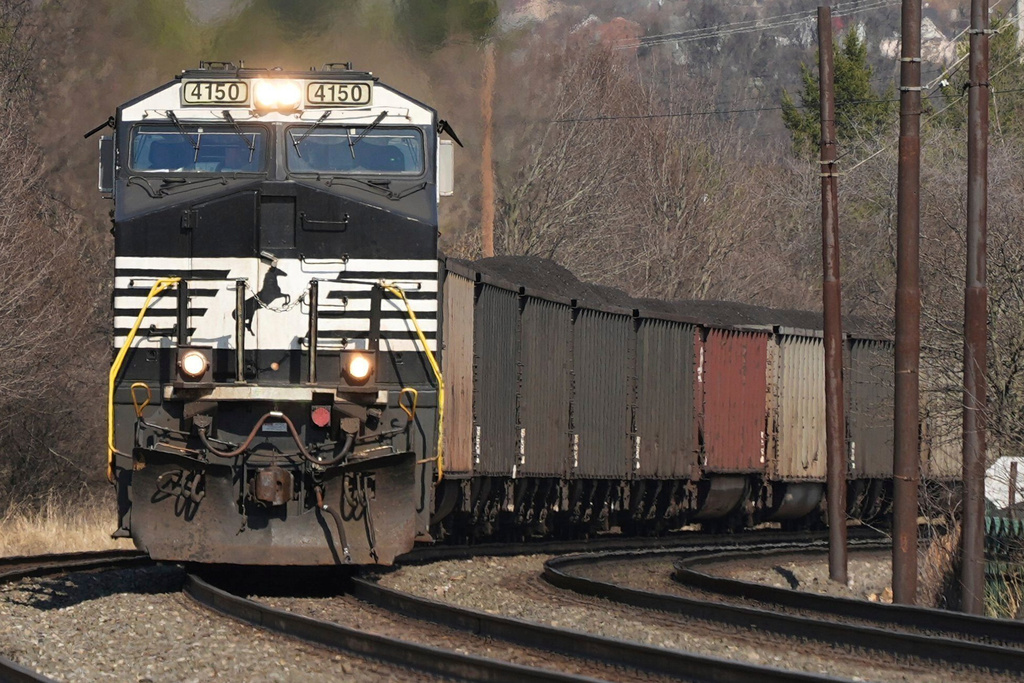 FILE - A Norfolk Southern freight train passes through Homestead, Pa., March 12, 2025. (AP Photo/Gene J. Puskar, File)