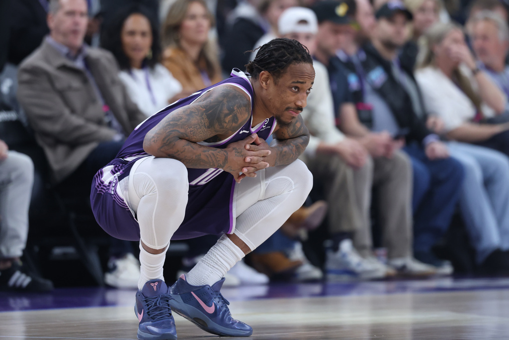 Sacramento Kings guard DeMar DeRozan waits for play to start before an NBA basketball game against the Utah Jazz, Wednesday, Feb. 11, 2026, in Salt Lake City. (AP Photo/Rob Gray)