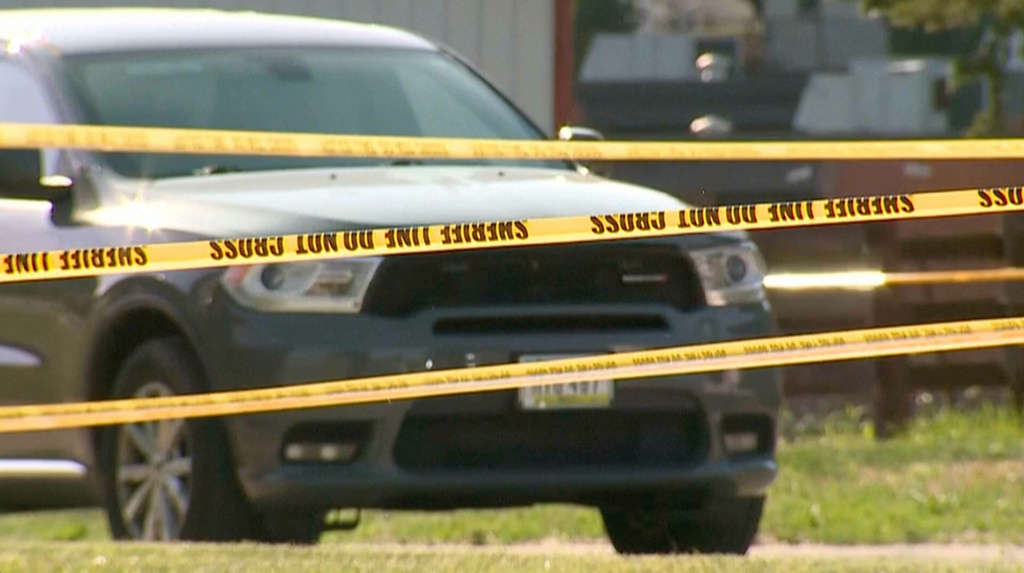 This image taken from video provided by WQAD, police investigate the fatal shootings of several people in Muscatine, Iowa on Monday, June 1, 2026. (WQAD via AP)