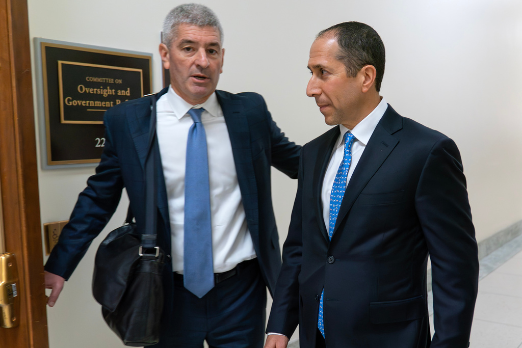 CORRECTS LAST NAME SPELLING TO KAHN - Richard Kahn, right, Jeffrey Epstein's accountant and co-executor of his estate, arrives for his deposition before the House Oversight Committee on Capitol Hill, Wednesday, March 11, 2026, in Washington. (AP Photo/Jose Luis Magana)