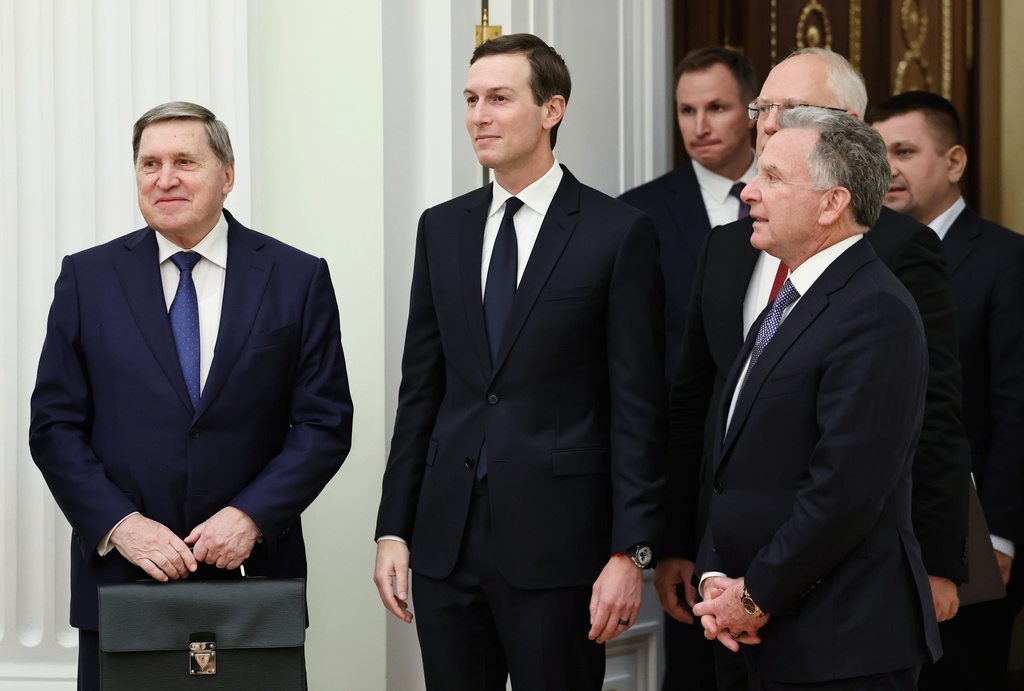FILE - Russian Presidential foreign policy adviser Yuri Ushakov, left, U.S. President Donald Trump's son-in-law Jared Kushner, center, U.S. special envoy Steve Witkoff, foreground right, and Russian Direct Investment Fund CEO Special Presidential Representative for Investment and Economic Cooperation with Foreign Countries Kirill Dmitriev, behind Witkoff, arrive to attend talks with Russian President Vladimir Putin at the Senate Palace of the Kremlin in Moscow, Russia, Dec. 2, 2025. (Alexander Kazakov, Sputnik, Kremlin Pool Photo via AP, File)