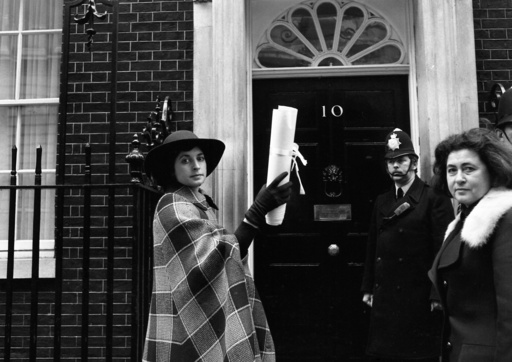 FILE - Actress Prunella Scales delivers a petition carrying the signatures of 100 prominent women to 10 Downing Street, London on February 11, 1975. (AP Photo/Robert Dear, File) FILE - Actress Prunella Scales delivers a petition carrying the signatures of 100 prominent women to 10 Downing Street, London on February 11, 1975. (AP Photo/Robert Dear, File)