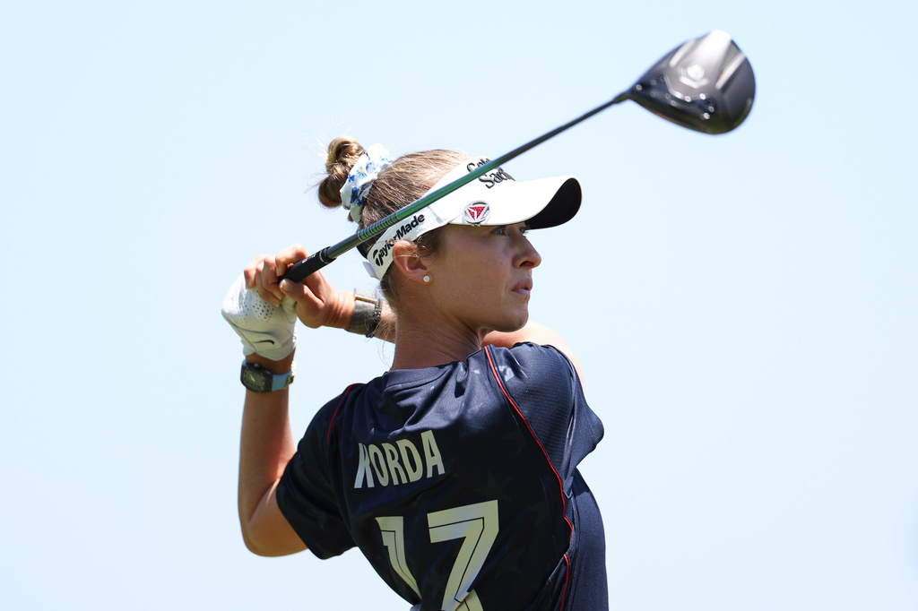 Nelly Korda, wearing a U.S soccer jersey, hits from the third tee during a practice round ahead of the U.S. Women's Open golf tournament Tuesday, June 2, 2026, in the Pacific Palisades area of Los Angeles. (AP Photo/Jessie Alcheh)