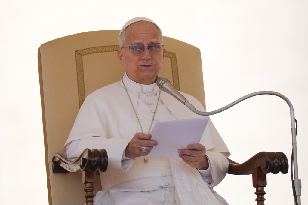 Pope Leo XIV delivers his message during the weekly general audience in St. Peter's Square, at the Vatican, Wednesday, March 25, 2026. (AP Photo/Alessandra Tarantino)