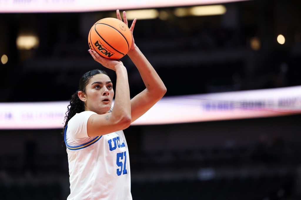 UCLA center Lauren Betts shoots a free throw during the first half of an NCAA college basketball game against San Diego State Monday, Nov. 3, 2025, in Anaheim, Calif. (AP Photo/Jessie Alcheh)