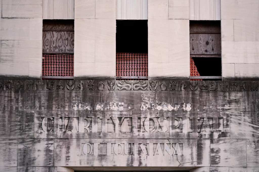The bas-relief over the entrance of the old Charity Hospital building is seen Wednesday, Aug. 19, 2026, in New Orleans. (AP Photo/Gerald Herbert)
