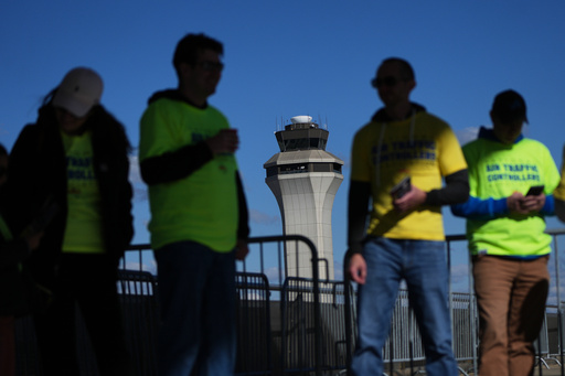Air Traffic Controllers stand outside distributing leaflets explaining how the federal government shutdown is impacting air travel at Detroit Metropolitan Wayne County Airport Tuesday, Oct. 28, 2025, in Romulus, Mich. (AP Photo/Paul Sancya) Air Traffic Controllers stand outside distributing leaflets explaining how the federal government shutdown is impacting air travel at Detroit Metropolitan Wayne County Airport Tuesday, Oct. 28, 2025, in Romulus, Mich. (AP Photo/Paul Sancya)