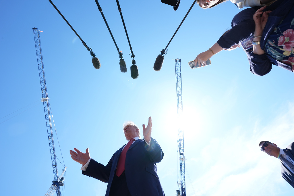 President Donald Trump speaks as he tours Ballroom construction around the outside the White House, Tuesday, May 19, 2026, in Washington. (AP Photo/Jacquelyn Martin)