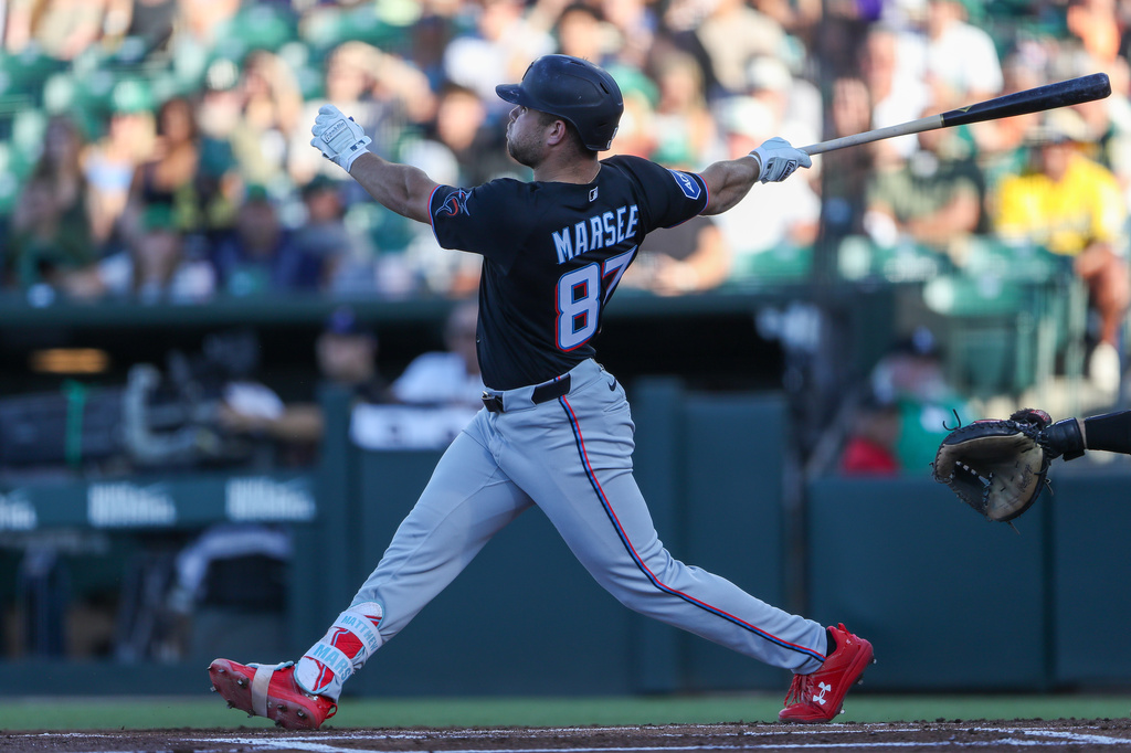 Miami Marlins' Jakob Marsee hits a solo home run during the first inning of a baseball game against the Athletics, Friday, July 3, 2026, in West Sacramento, Calif. (AP Photo/Scott Marshall)