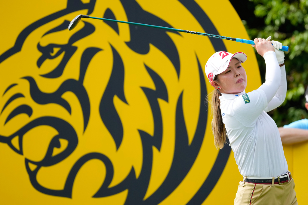 Yuri Yoshida of Japan tees off on the third tee during the first day of LPGA Maybank Championship in Kuala Lumpur, Malaysia, Thursday, Oct. 29, 2026. (AP Photo/Vincent Thian)