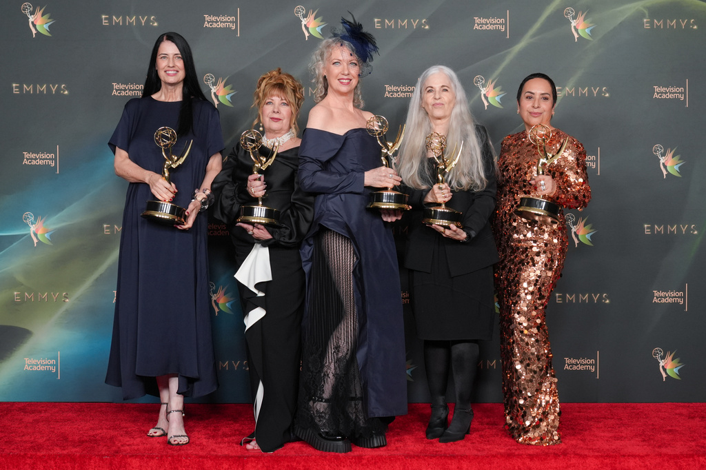 The team from "Margo's Got Money Troubles" poses in the press room with the award for outstanding contemporary makeup (non-prosthetic) during night two of the Creative Arts Emmy Awards on Sunday, Sept. 6, 2026, in Los Angeles. (AP Photo/Chris Pizzello)