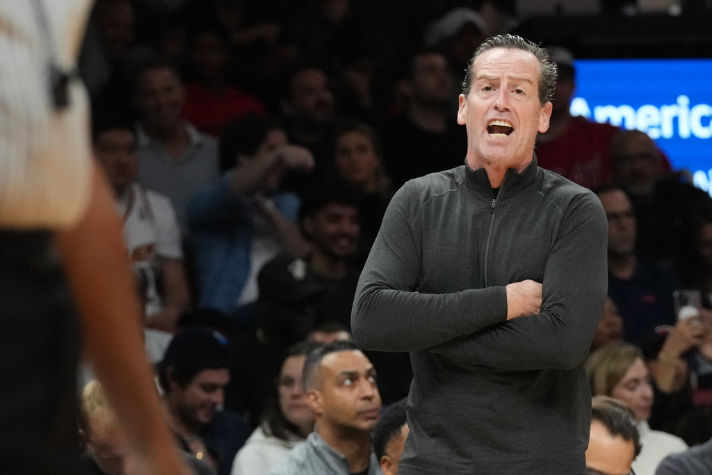 Cleveland Cavaliers head coach Kenny Atkinson reacts after he is charged with a technical foul during the first half of an NBA basketball game against the Miami Heat Monday, Nov. 10, 2025, in Miami. (AP Photo/Marta Lavandier)