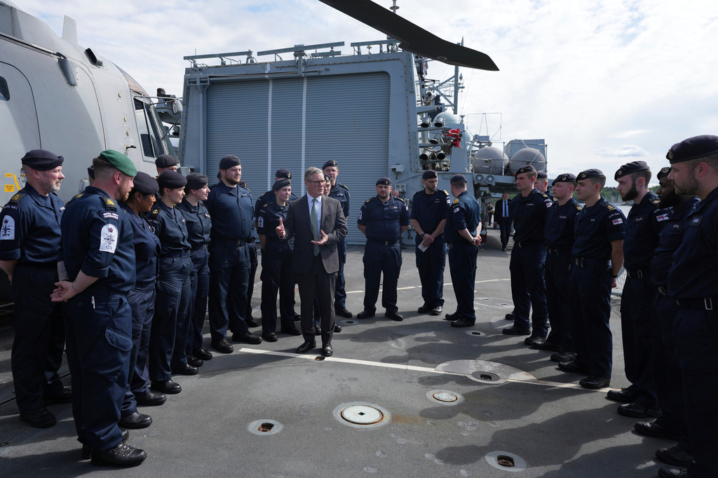 FILE - Britain's Prime Minister Keir Starmer speaks to Royal Marines onboard the HMS ST Albans in Oslo, during his visit to Norway on Friday, May 9, 2025.(AP Photo/Alastair Grant, Pool, File)