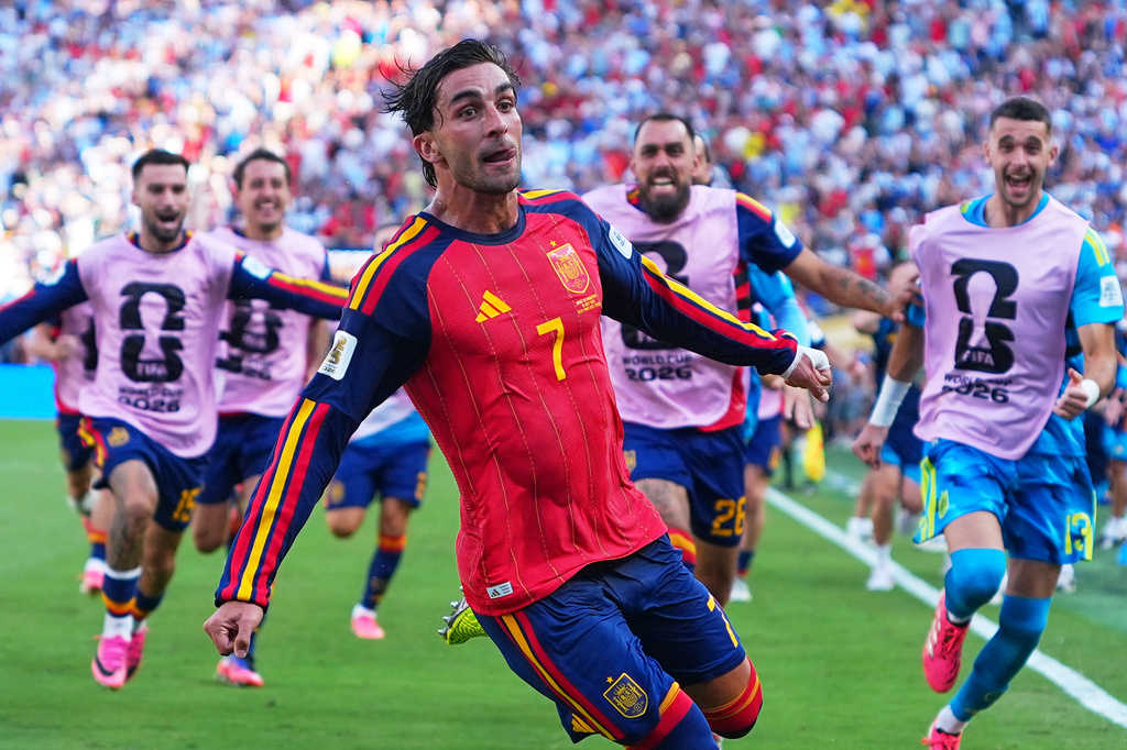 Spain's Ferran Torres (7) celebrates scoring their first goal during the World Cup final soccer match between Spain and Argentina in East Rutherford, N.J., near New York, Sunday, July 19, 2026. (AP Photo/Julio Cortez)