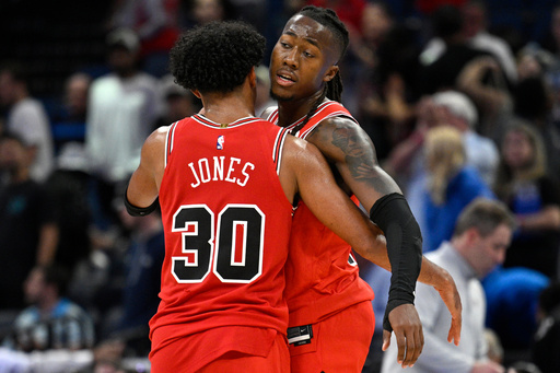 Chicago Bulls guard Tre Jones (30) and guard Ayo Dosunmu congratulate each other after a win against the Orlando Magic in an NBA basketball game, Saturday, Oct. 25, 2025, in Orlando, Fla. (AP Photo/Phelan M. Ebenhack) Chicago Bulls guard Tre Jones (30) and guard Ayo Dosunmu congratulate each other after a win against the Orlando Magic in an NBA basketball game, Saturday, Oct. 25, 2025, in Orlando, Fla. (AP Photo/Phelan M. Ebenhack)