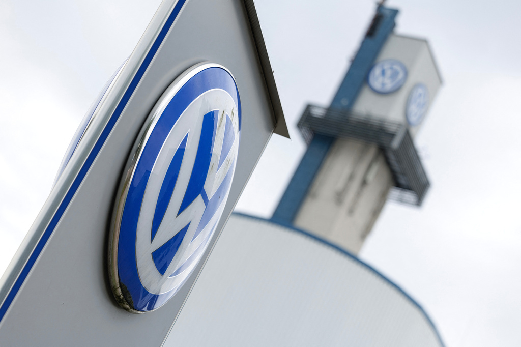 The VW logo in front of the Volkswagen plant in Osnabrueck, Germany, Wednesday, Aug. 26, 2026. (David Ebener/dpa via AP)