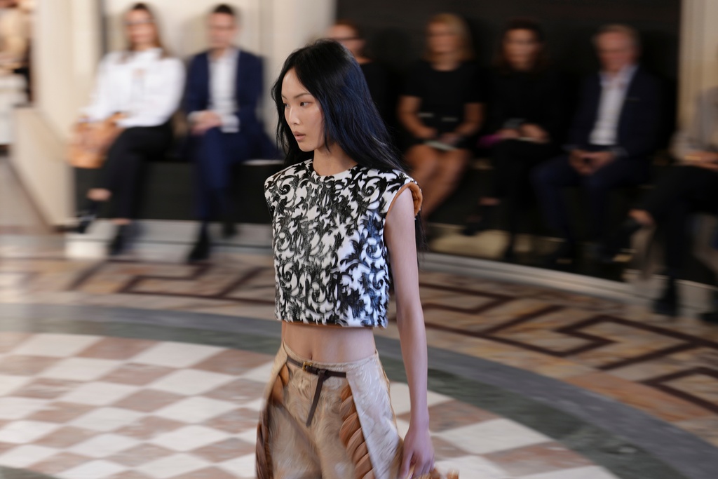 A model wears a creation as part of the Louis Vuitton Spring/Summer 2026 collection presented in Paris, Tuesday, Sept. 30, 2025. (AP Photo/Aurelien Morissard)
