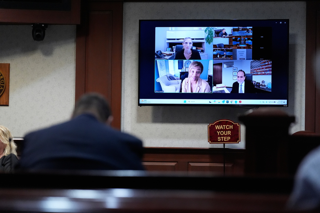 Comedian and actor Tiffany Haddish appears via Zoom for trial on DUI charges Tuesday, Aug. 11, 2026, in Fayetteville, Ga. (AP Photo/Brynn Anderson)