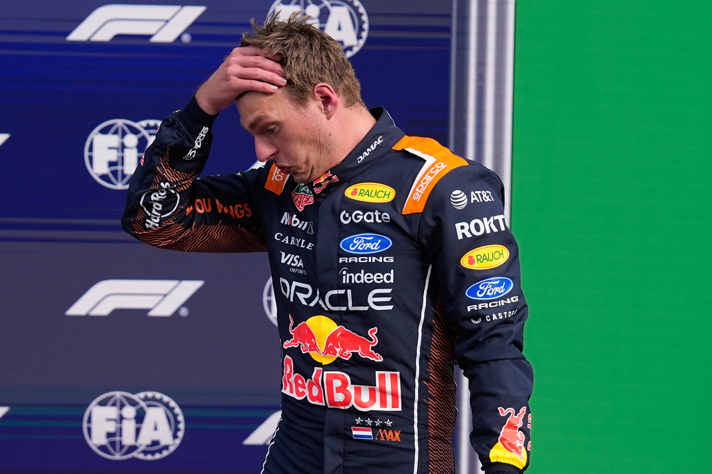 Red Bull driver Max Verstappen of the Netherlands reacts after the sprint qualifying for the Formula One Dutch Grand Prix in Zandvoort , Netherlands, Friday, Aug. 21, 2026. (AP Photo/Darko Bandic)