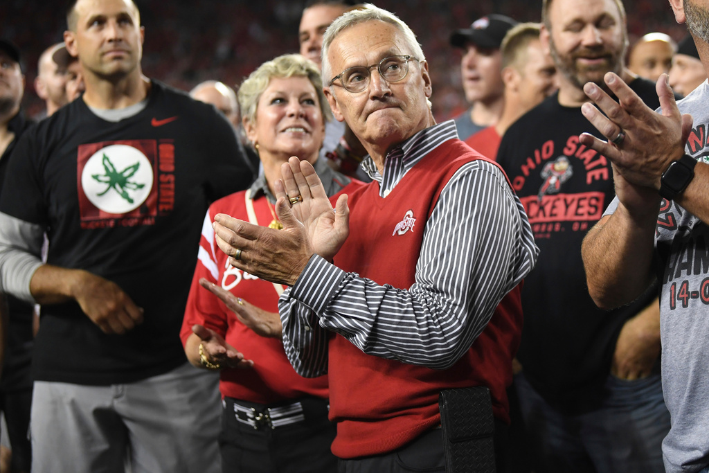 FILE - Former Ohio State head coach Jim Tressel watches a scoreboard tribute for the 2002 national championship team during the second quarter of an NCAA college football game between Notre Dame and Ohio State, Sept. 3, 2022, in Columbus, Ohio. (AP Photo/David Dermer, File)