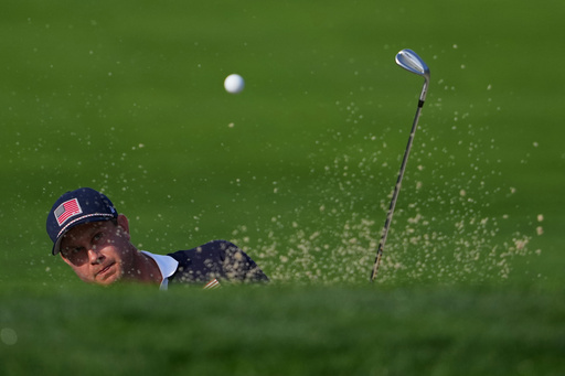 United States' Harris English hits from the bunker on the seventh hole at Bethpage Black golf course during the Ryder Cup golf tournament, Saturday, Sept. 27, 2025, in Farmingdale, N.Y. (AP Photo/Lindsey Wasson) United States' Harris English hits from the bunker on the seventh hole at Bethpage Black golf course during the Ryder Cup golf tournament, Saturday, Sept. 27, 2025, in Farmingdale, N.Y. (AP Photo/Lindsey Wasson)