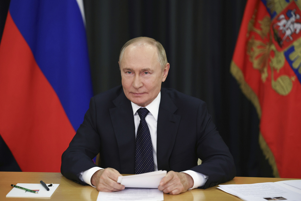 Russian President Vladimir Putin takes part, via videoconference in Sochi, Russia, Monday, Sept. 8, 2025, in the main plenary session of the 17th BRICS Summit in Rio de Janeiro under Brazilian Chairmanship. (Vyacheslav Prokofyev, Sputnik, Kremlin Pool Photo via AP)