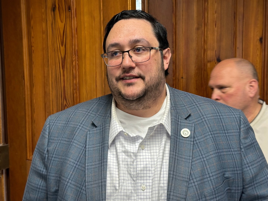 Georgia Ethics Commission Executive Director David Emadi speaks to reporters after a state Senate committee hearing on Thursday, Nov. 13, 2025 at the Georgia Capitol in Atlanta. (AP Photo/Jeff Amy)