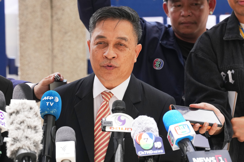 Lawyer Chuchart Kanpai talks to reporters after he left a courtroom at Bangkok South Criminal Court in Bangkok, Thailand, Thursday, June 11, 2026. (AP Photo/Sakchai Lalit)