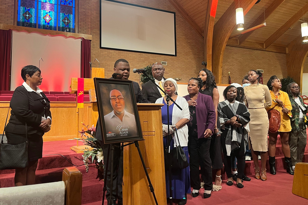 FILE - Attorney Harry Daniels demands justice for Charles Adair, a man killed when a deputy kneeled on his back in a Kansas jail, as Adair's mother, Ruby Smith, stands by Daniels' side during a news conference at Friendship Baptist Church in Kansas City, Mo., Sunday, Sept. 23, 2025. (AP Photo/Heather Hollingsworth, File)