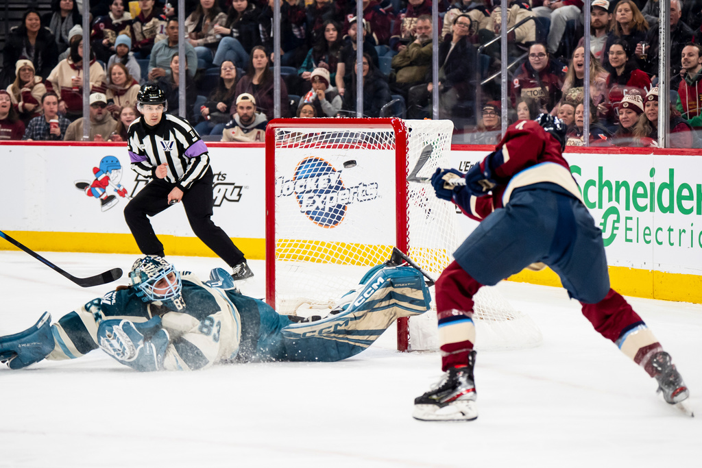 Montreal Victoire's Laura Stacey (7) scores on Seattle Torrent goaltender Hannah Murphy (83) during second period PWHL hockey action in Laval, Que., on Thursday, March 19, 2026. (Christopher Katsarov/The Canadian Press via AP)