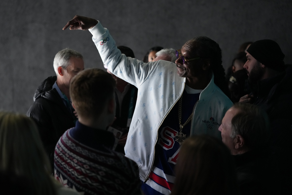 Snoop Dogg attends the men's ice hockey quarterfinal game between the United States and Sweden at the 2026 Winter Olympics, in Milan, Italy, Wednesday, Feb. 18, 2026. (AP Photo/Carolyn Kaster)