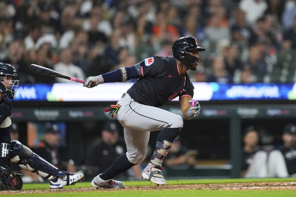 Cleveland Guardians' Angel Martínez hits a one-run single against the Detroit Tigers during the sixth inning of a baseball game Wednesday, Sept. 17, 2025, in Detroit. (AP Photo/Paul Sancya)
