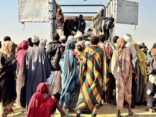 This photo released by The Norwegian Refugee Council (NRC) shows displaced families from el-Fasher at a displacement camp where they sought refuge from fighting between government forces and the RSF, in Tawila, Darfur region, Sudan, Friday, October. 31, 2025. (NRC via AP) This photo released by The Norwegian Refugee Council (NRC) shows displaced families from el-Fasher at a displacement camp where they sought refuge from fighting between government forces and the RSF, in Tawila, Darfur region, Sudan, Friday, October. 31, 2025. (NRC via AP)