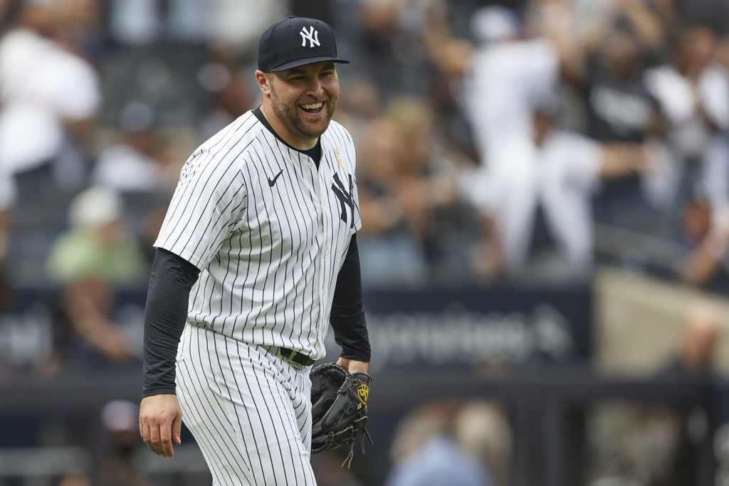 New York Yankees pitcher David Bednar reacts after the final out of the ninth inning of a baseball game against the Toronto Blue Jays, Sunday, Sept. 7, 2025, in New York. (AP Photo/Heather Khalifa)