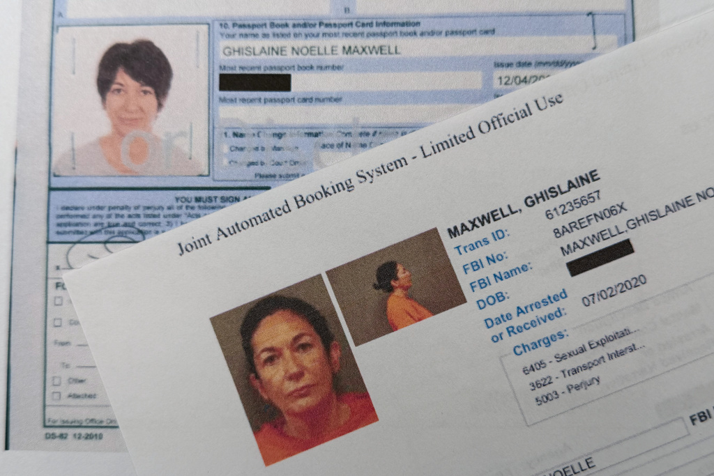 A document that was included in the U.S. Department of Justice release of the Jeffrey Epstein files, photographed Tuesday, Feb. 3, 2026, shows a U.S. passport renewal in 2012 and a federal booking system form from 2020 for Ghislaine Maxwell. (AP Photo/Jon Elswick)