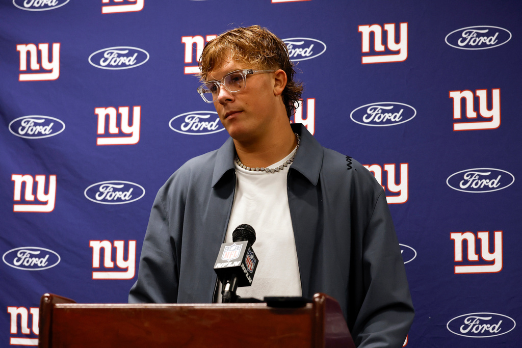 New York Giants quarterback Jaxson Dart talks to media after a loss to the New Orleans Saints in an NFL football game, Sunday, Oct. 5, 2025, in New Orleans. (AP Photo/Butch Dill)